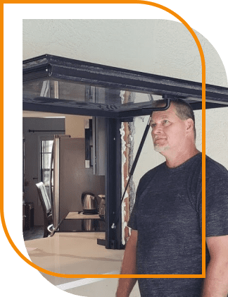 Man repairing kitchen window